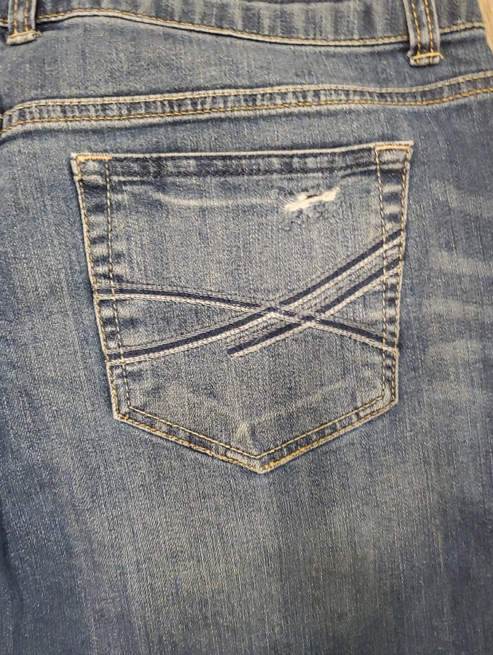 Distressed Medium Wash Denim Shorts